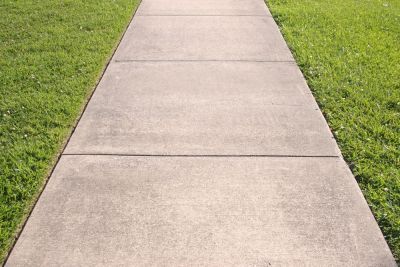 Improve Appearance and Function with Cement Sidewalk Replacement!