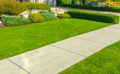 Improve The Functionality of Your Outdoor Space With Professional Concrete Walkway Installation