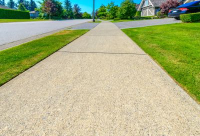 Improve The Curb Appeal of Your Property With Professional Concrete Walkway Installation
